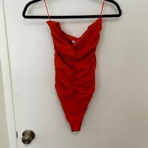 Strapless orange Zara bodysuit. Size large.